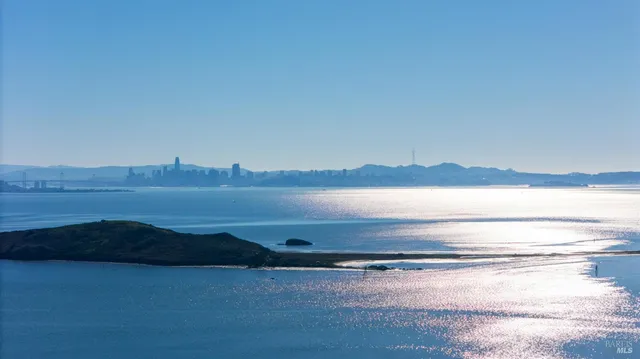 a view of ocean and mountain