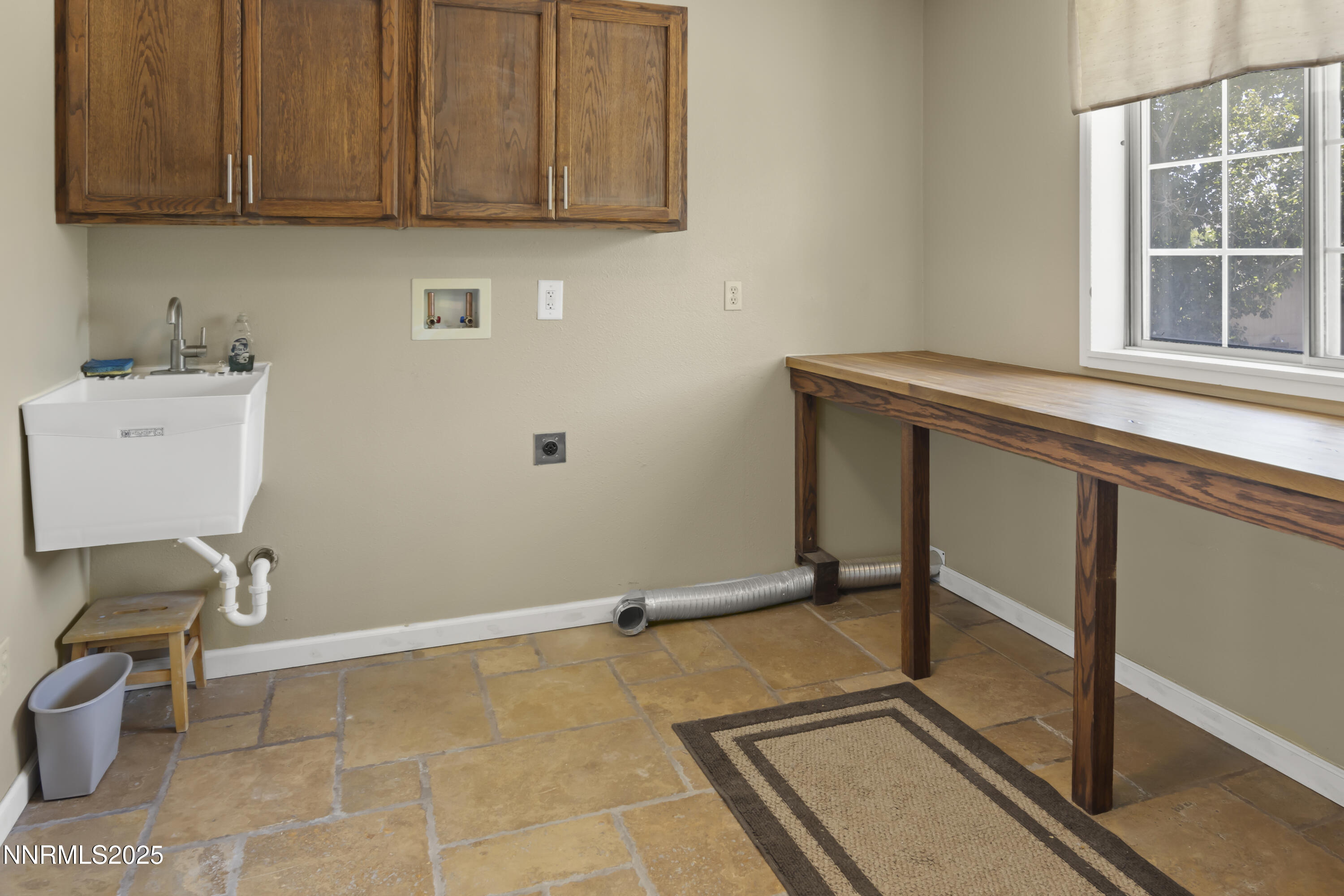 1165 Farm Lane Fernley, NV 89408 - Photo 20 of 38 a view of a room with washing machine