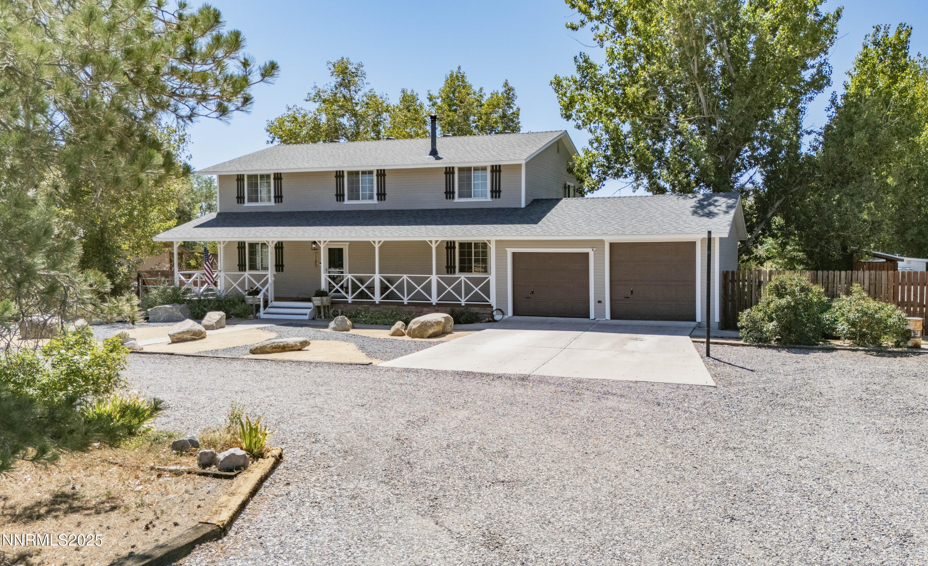 1165 Farm Lane Fernley, NV 89408 - Photo 2 of 38 a front view of a house with swimming pool