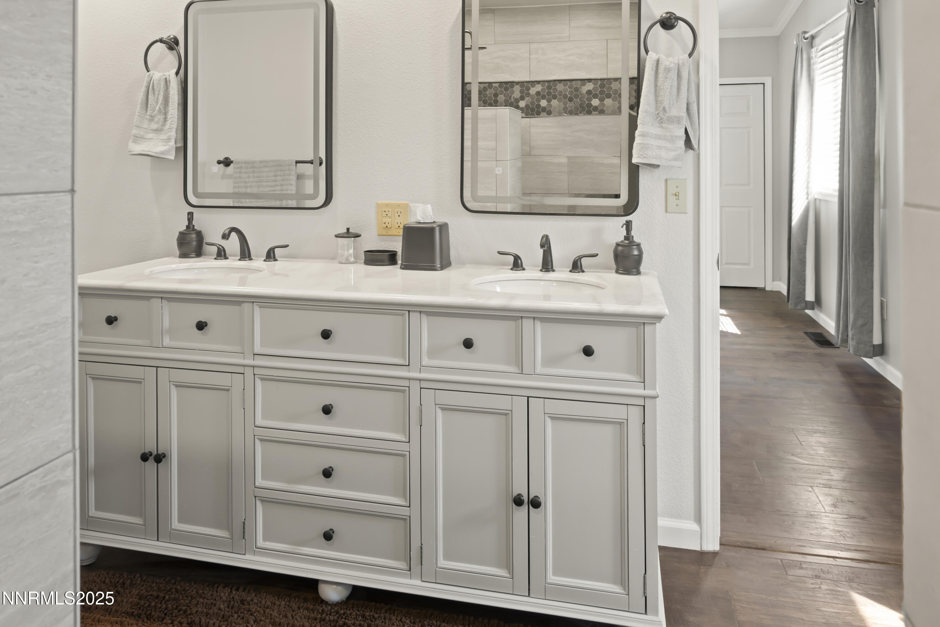1165 Farm Lane Fernley, NV 89408 - Photo 27 of 38 a bathroom with a sink double vanity and a mirror