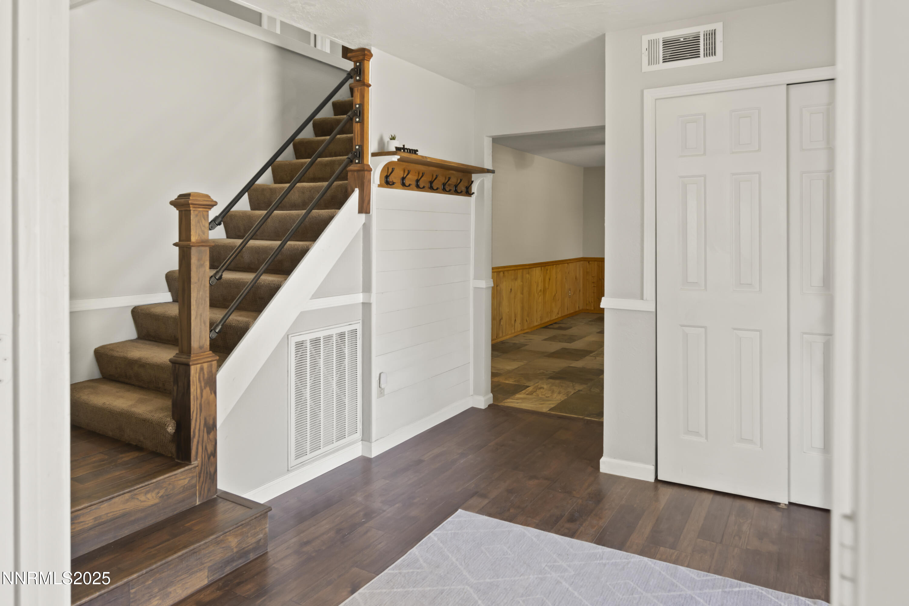 1165 Farm Lane Fernley, NV 89408 - Photo 4 of 38 a view of entryway and hall with wooden floor