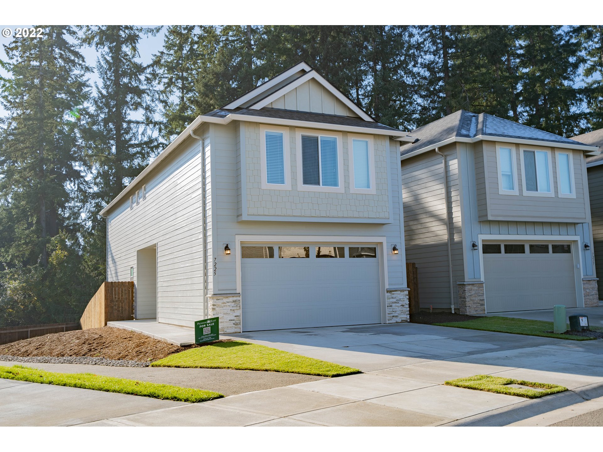 7225 South 13th Street Ridgefield, WA 98642 - Photo 1 of 30 a front view of a house with a yard