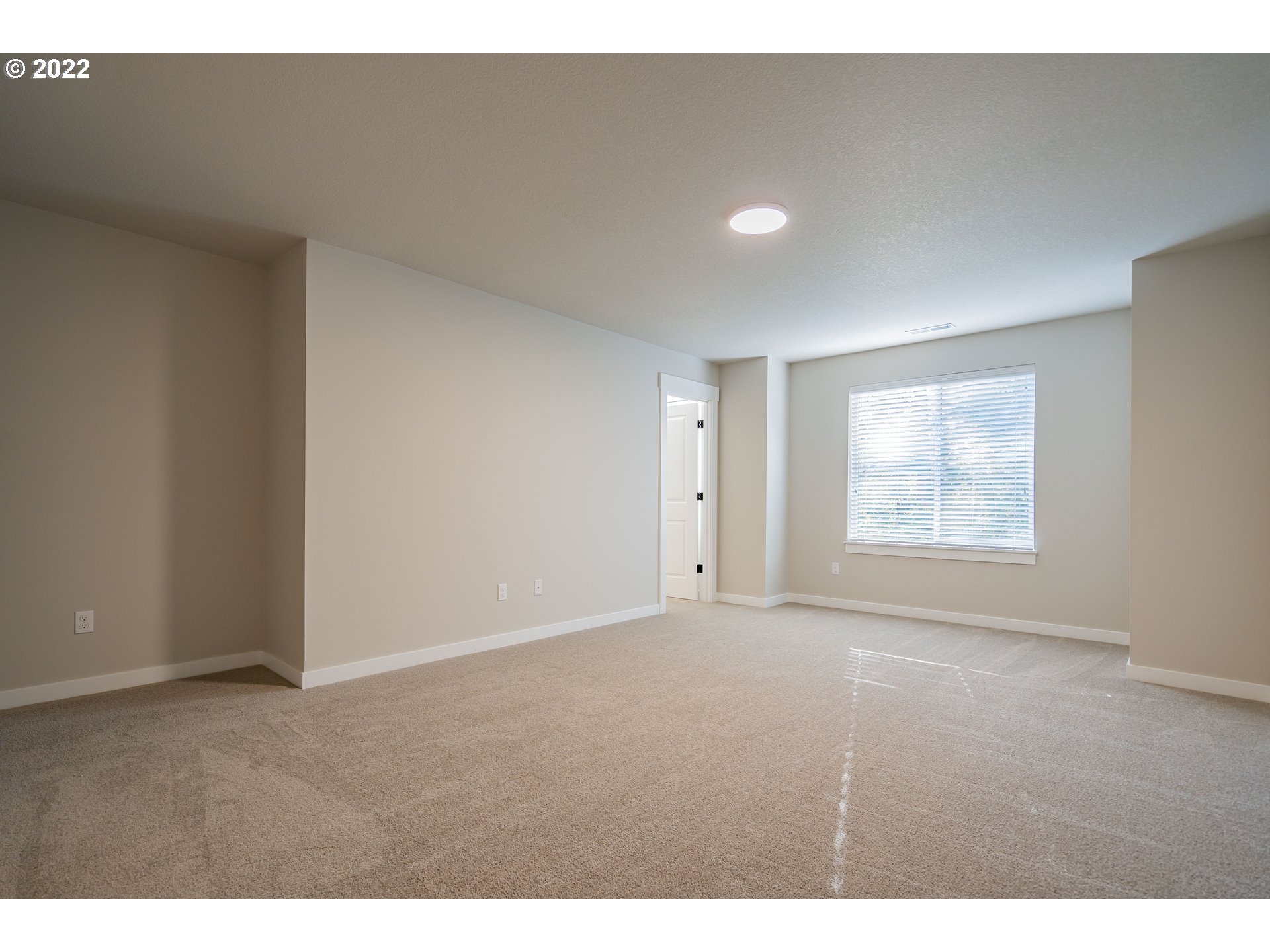 7225 South 13th Street Ridgefield, WA 98642 - Photo 11 of 30 a view of an empty room with a window