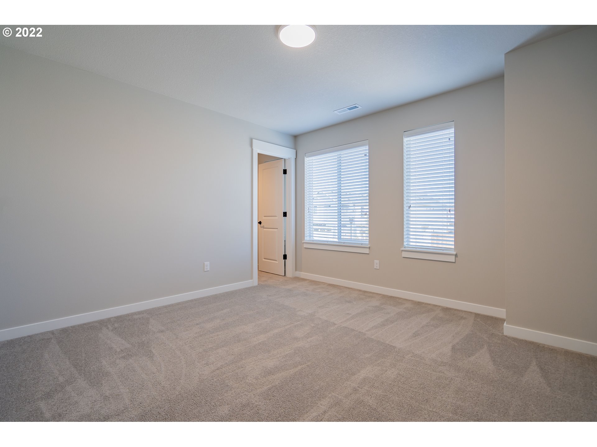 7225 South 13th Street Ridgefield, WA 98642 - Photo 23 of 30 a view of an empty room with a window