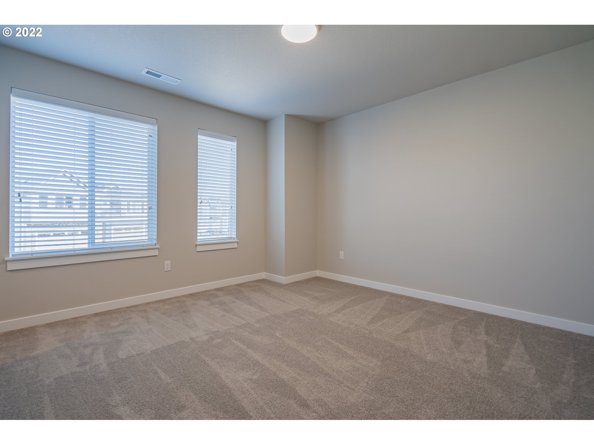 7225 South 13th Street Ridgefield, WA 98642 - Photo 24 of 30 a view of an empty room with a window