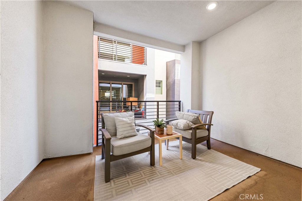171 Cadence Irvine, CA 92618 - Photo 16 of 27 a living room with furniture and a window