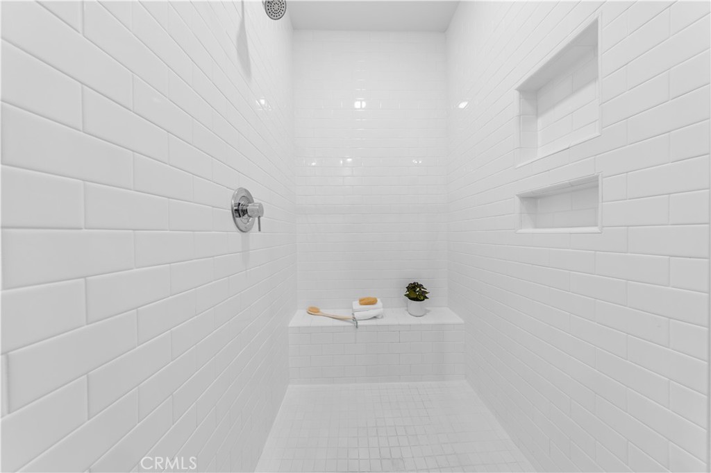 171 Cadence Irvine, CA 92618 - Photo 22 of 27 a bathroom with a shower