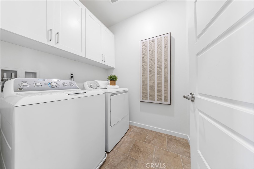 171 Cadence Irvine, CA 92618 - Photo 24 of 27 a utility room with dryer and washer