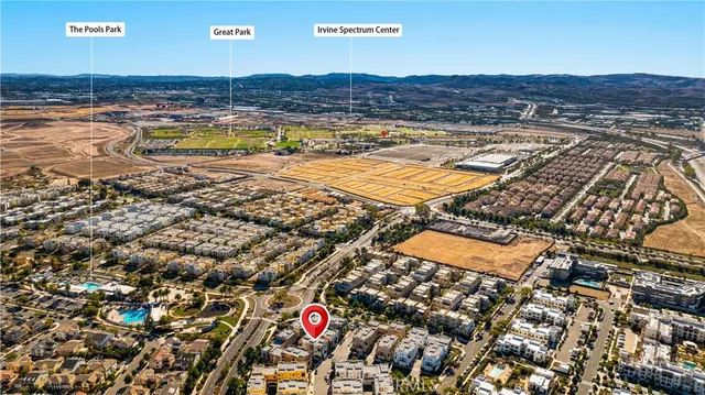 an aerial view of residential building and lake view