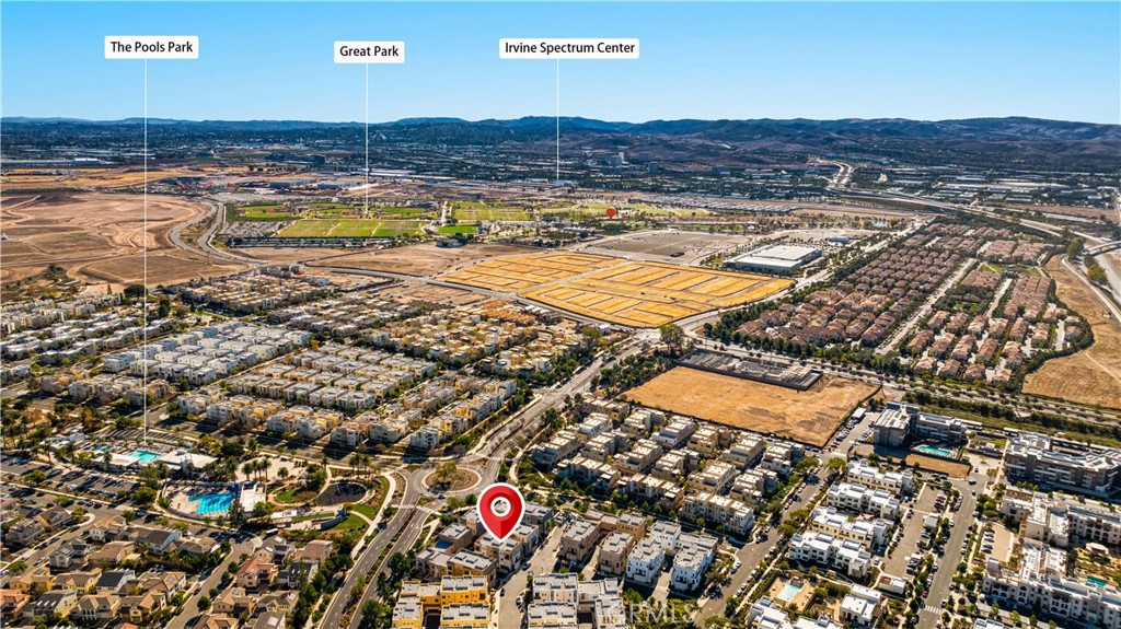 171 Cadence Irvine, CA 92618 - Photo 27 of 27 an aerial view of residential building and lake view