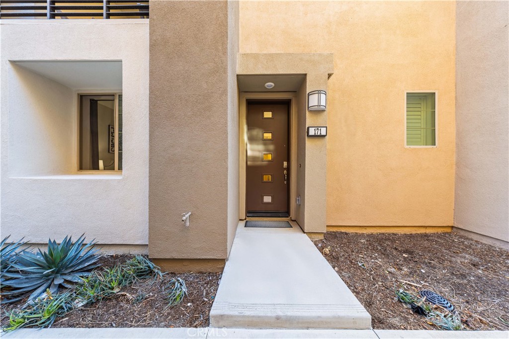 171 Cadence Irvine, CA 92618 - Photo 3 of 27 a view of a entrance door of the house