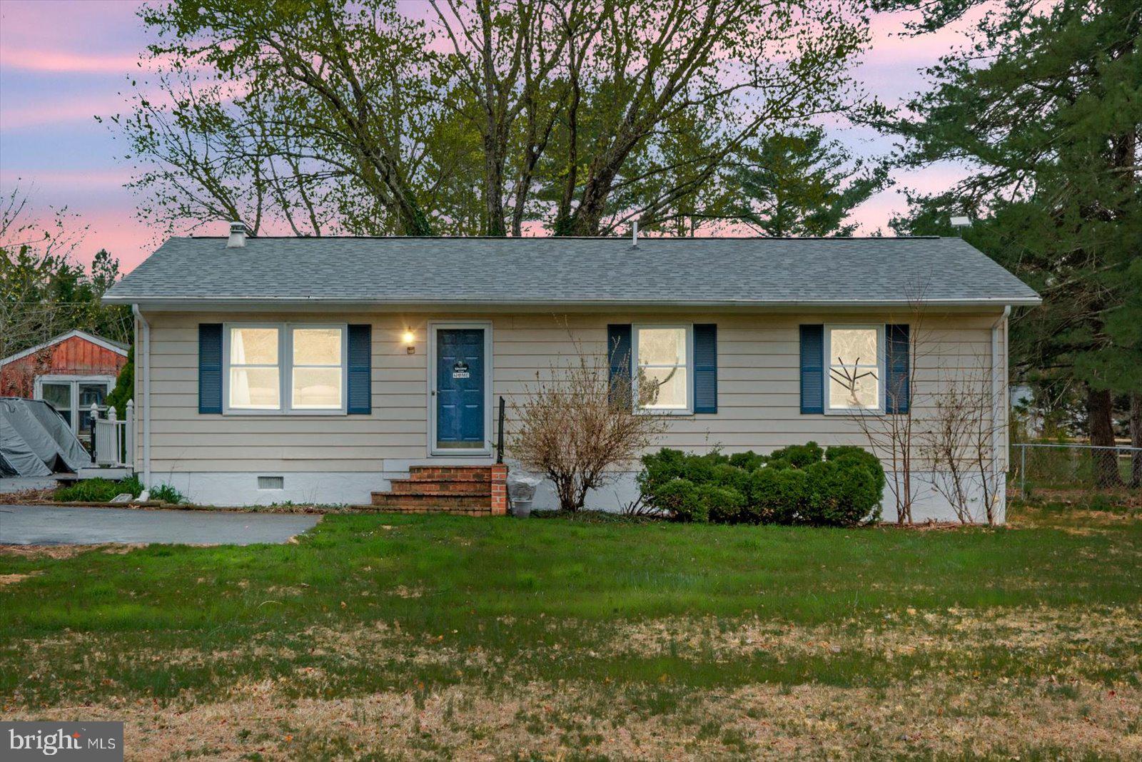 8441 Pamunkey Road Spotsylvania, VA 22551 - Photo 1 of 32 a view of a house with a yard and tree
