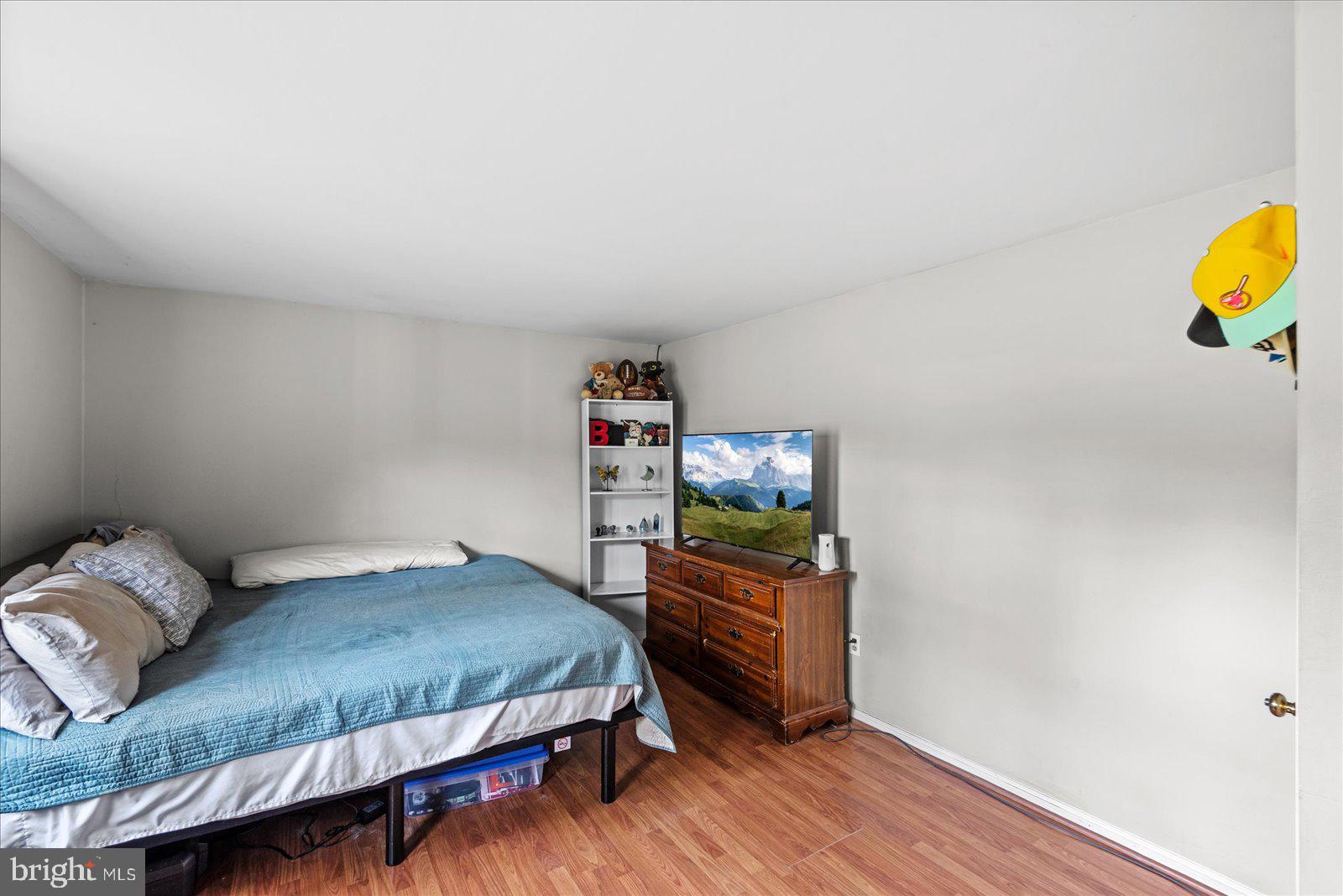 8441 Pamunkey Road Spotsylvania, VA 22551 - Photo 15 of 32 a bedroom with a bed and a dresser