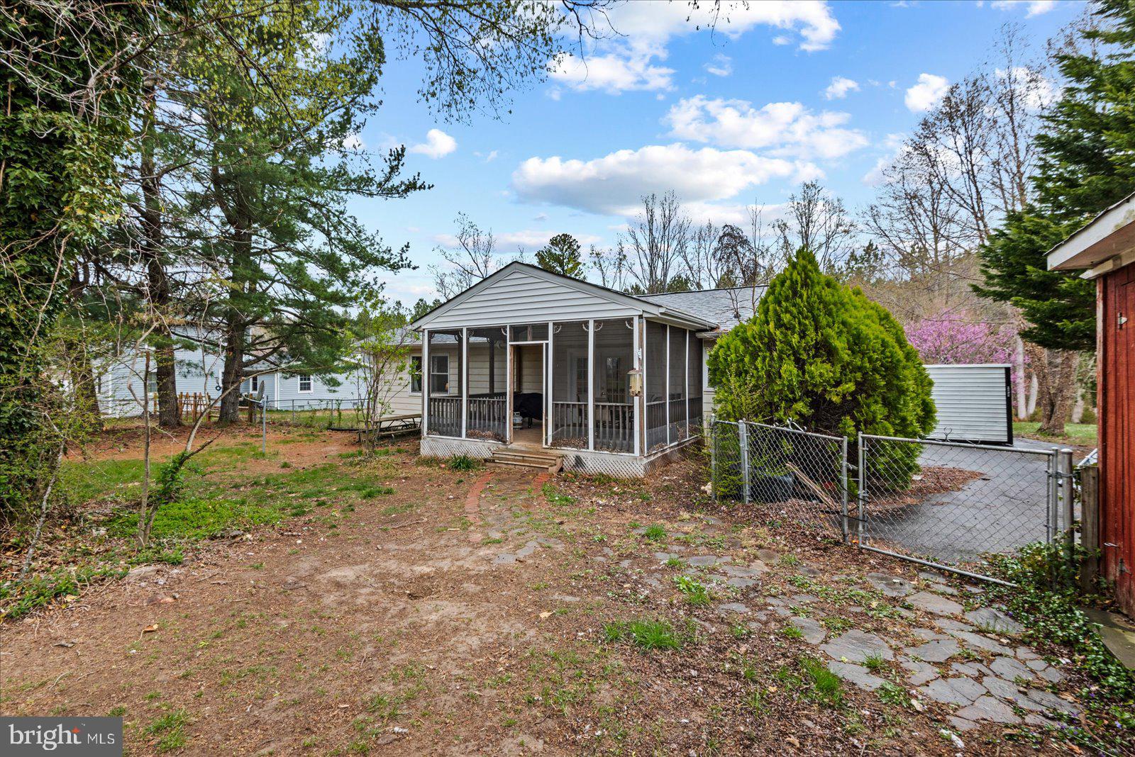 8441 Pamunkey Road Spotsylvania, VA 22551 - Photo 24 of 32 a view of a house with a garden