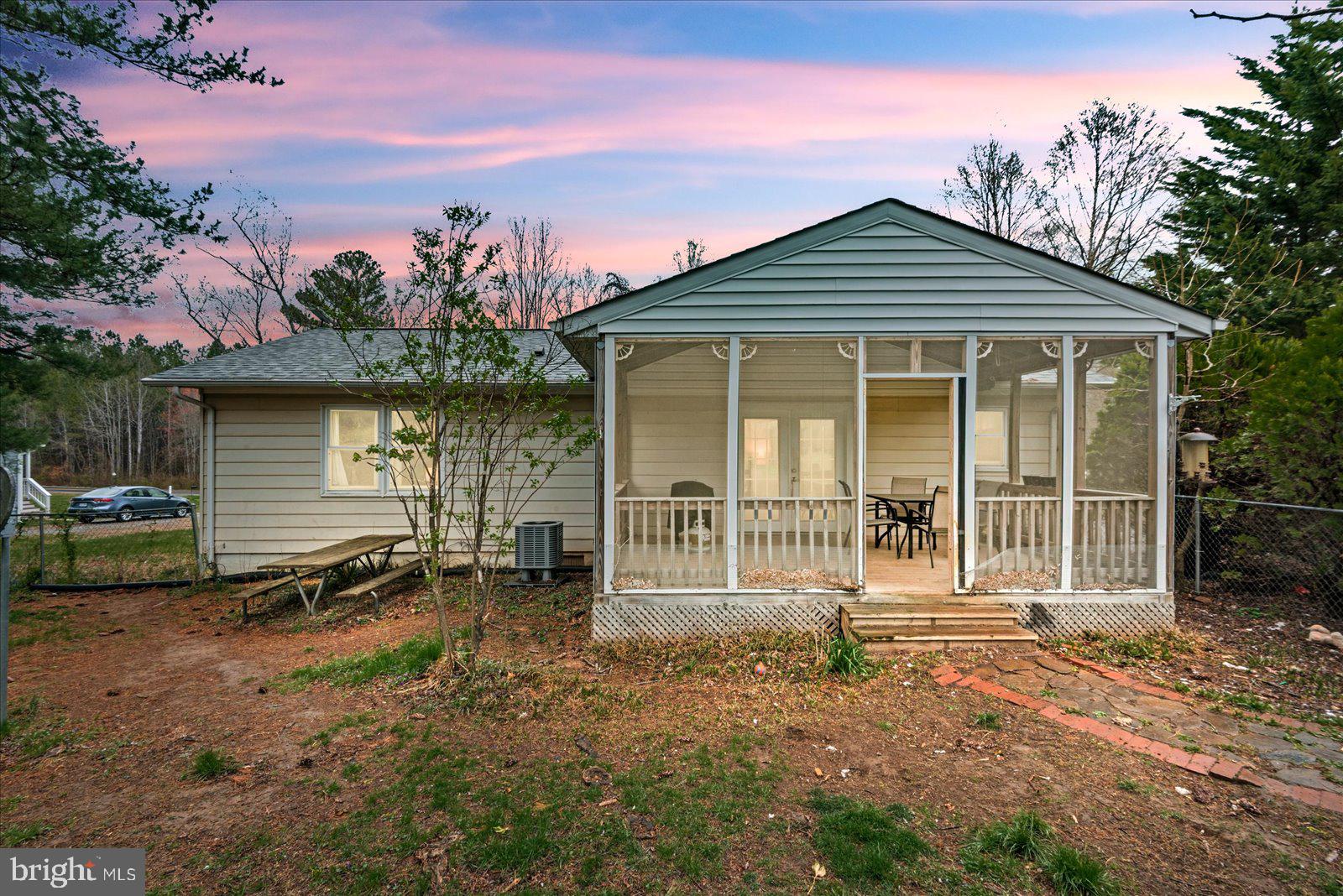 8441 Pamunkey Road Spotsylvania, VA 22551 - Photo 26 of 32 a front view of a house with a yard