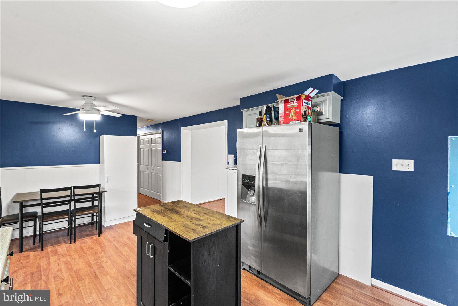 8441 Pamunkey Road Spotsylvania, VA 22551 - Photo 6 of 32 a kitchen with stainless steel appliances granite countertop a refrigerator and a stove