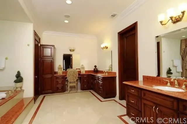 a bedroom with a bed and furniture