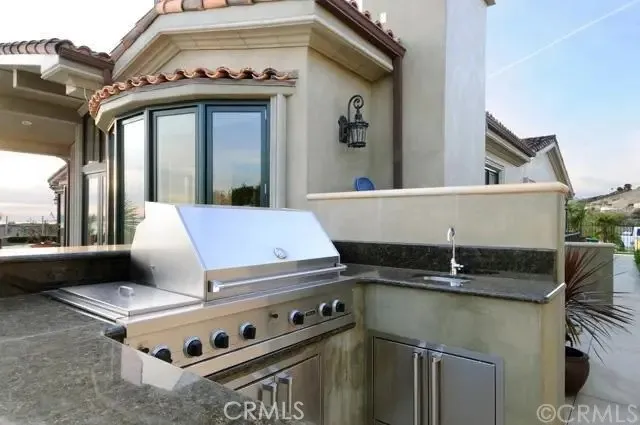 a view of living room with furniture and large window