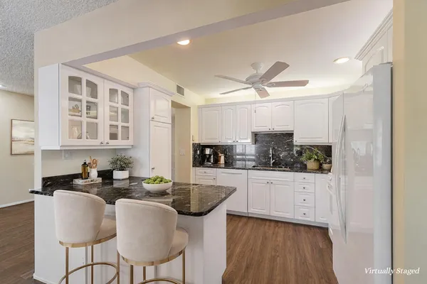 a view of swimming pool with a lake view