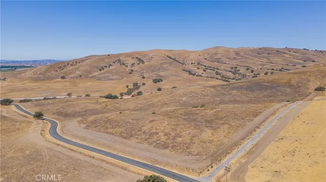 a view of view of a large building with a mountain in the background