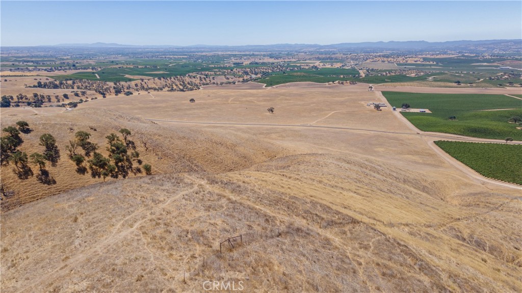 0 Cross Canyons Road San Miguel, CA 93451 - Photo 5 of 39 an aerial view of a house with a yard and ocean view
