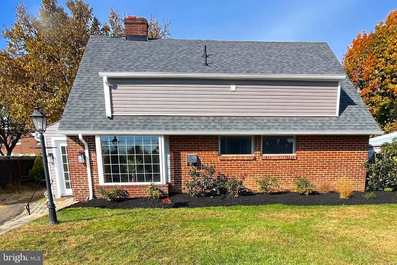 9106 Verree Road Philadelphia, PA 19115 - Photo 1 of 64 a front view of a house with a yard