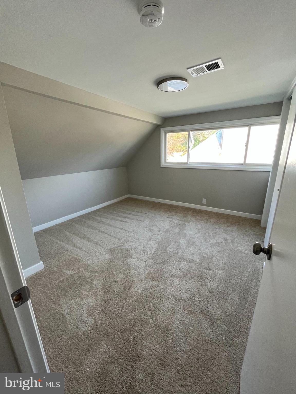 9106 Verree Road Philadelphia, PA 19115 - Photo 41 of 64 a view of an empty room with a window