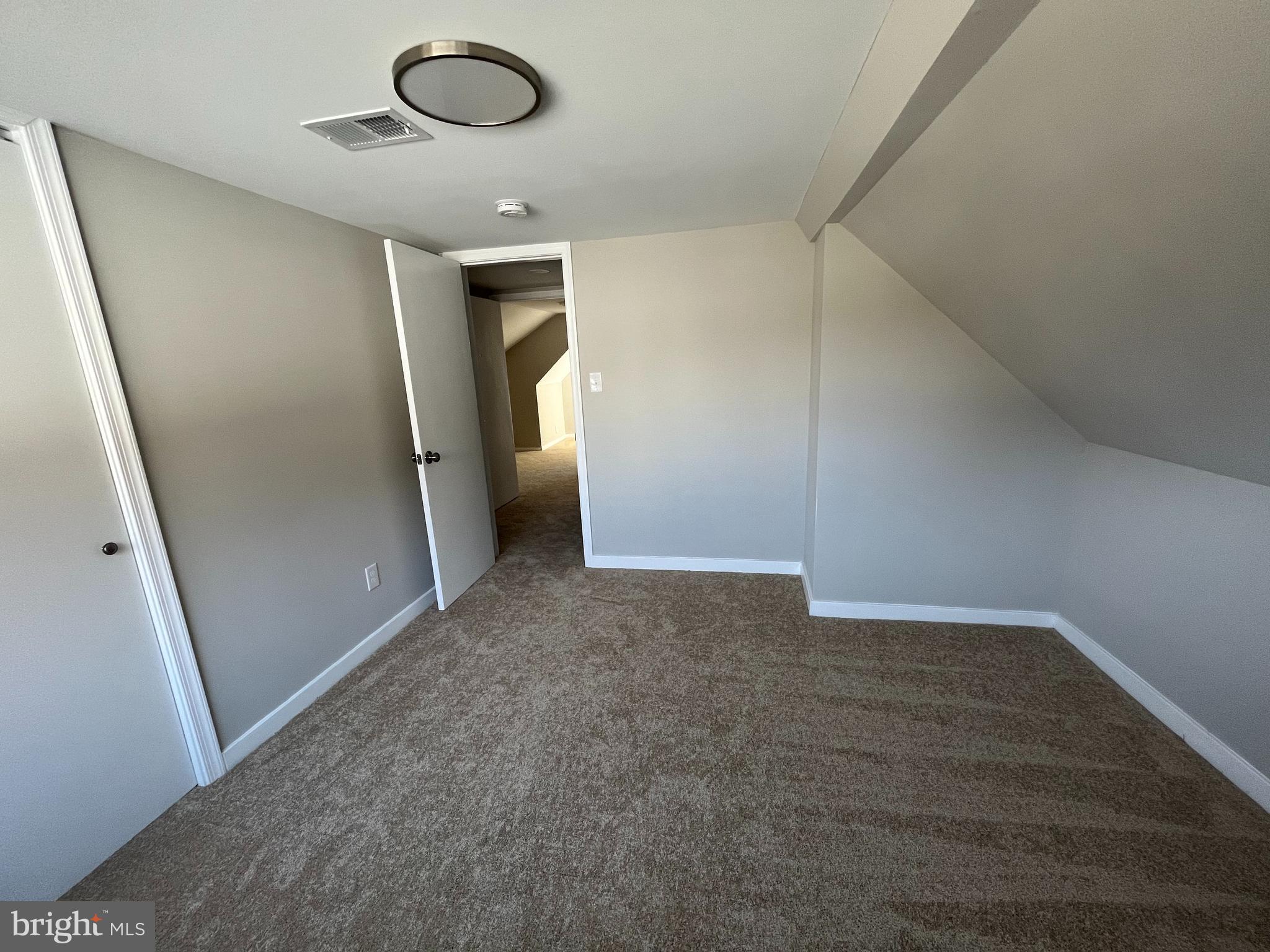 9106 Verree Road Philadelphia, PA 19115 - Photo 45 of 64 an empty room with closet and mirror
