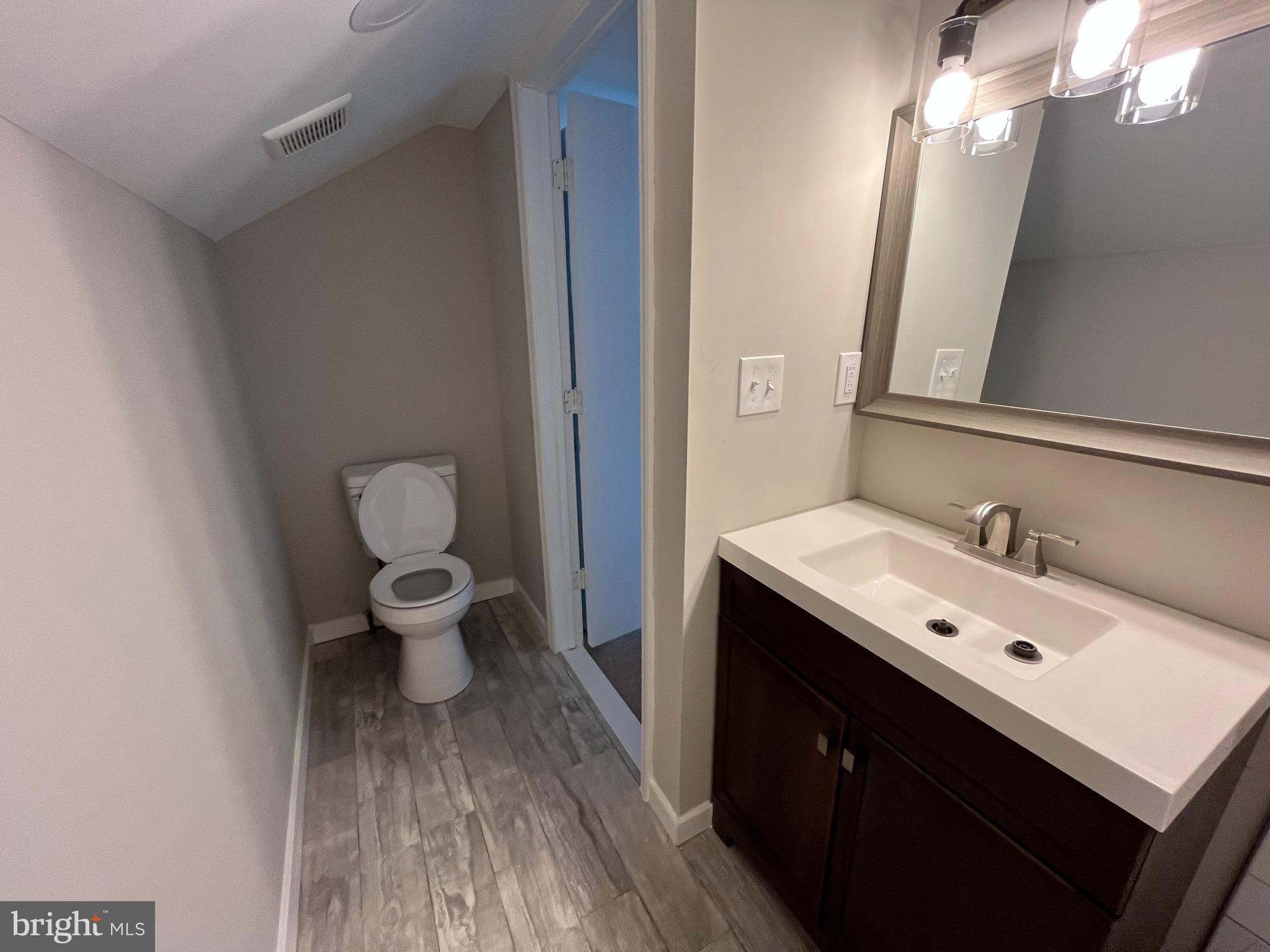 9106 Verree Road Philadelphia, PA 19115 - Photo 48 of 64 a bathroom with a sink and a mirror