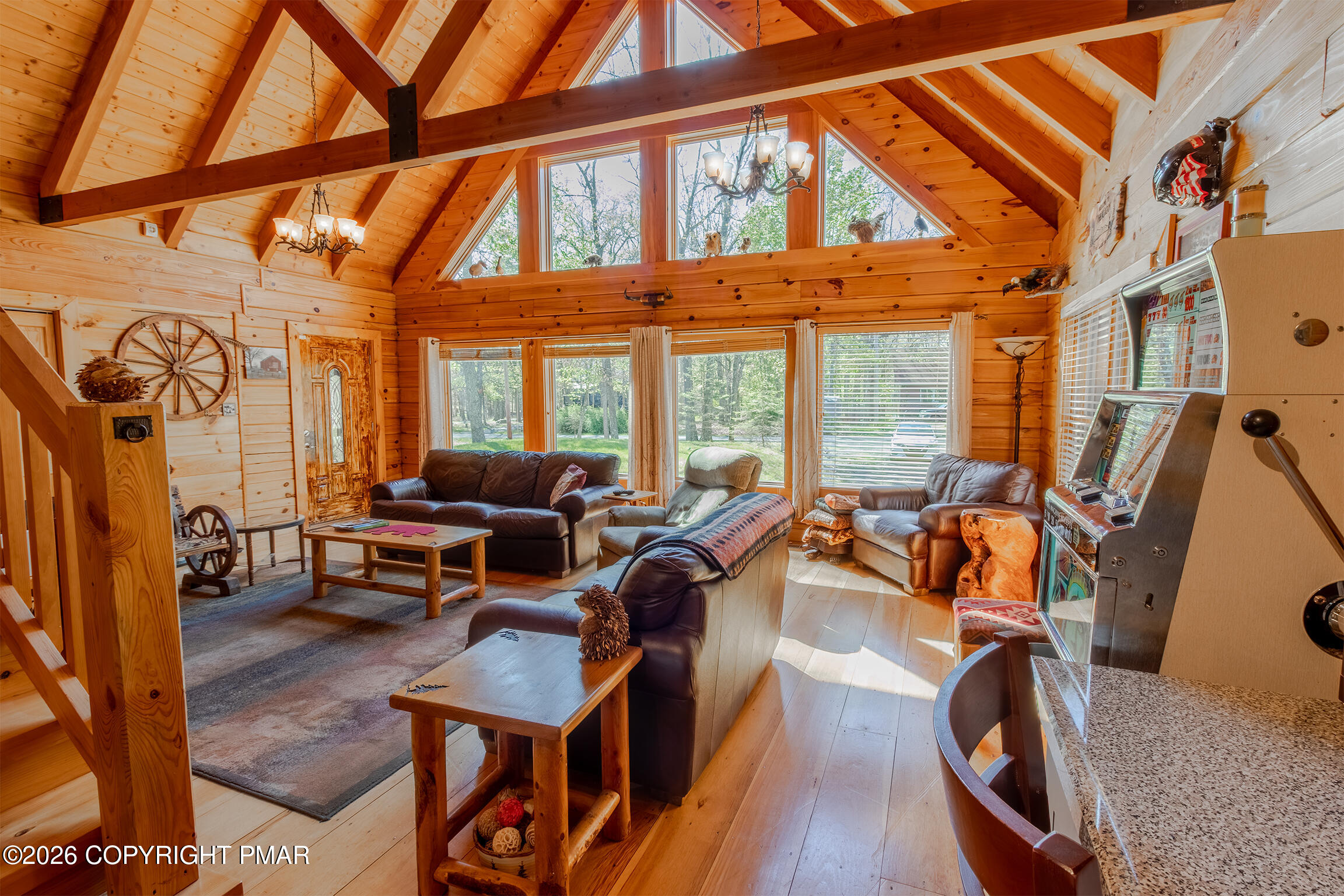 1160 Bluebird Lane Bushkill, PA 18324 - Photo 8 of 44 a living room with furniture a couch and large windows