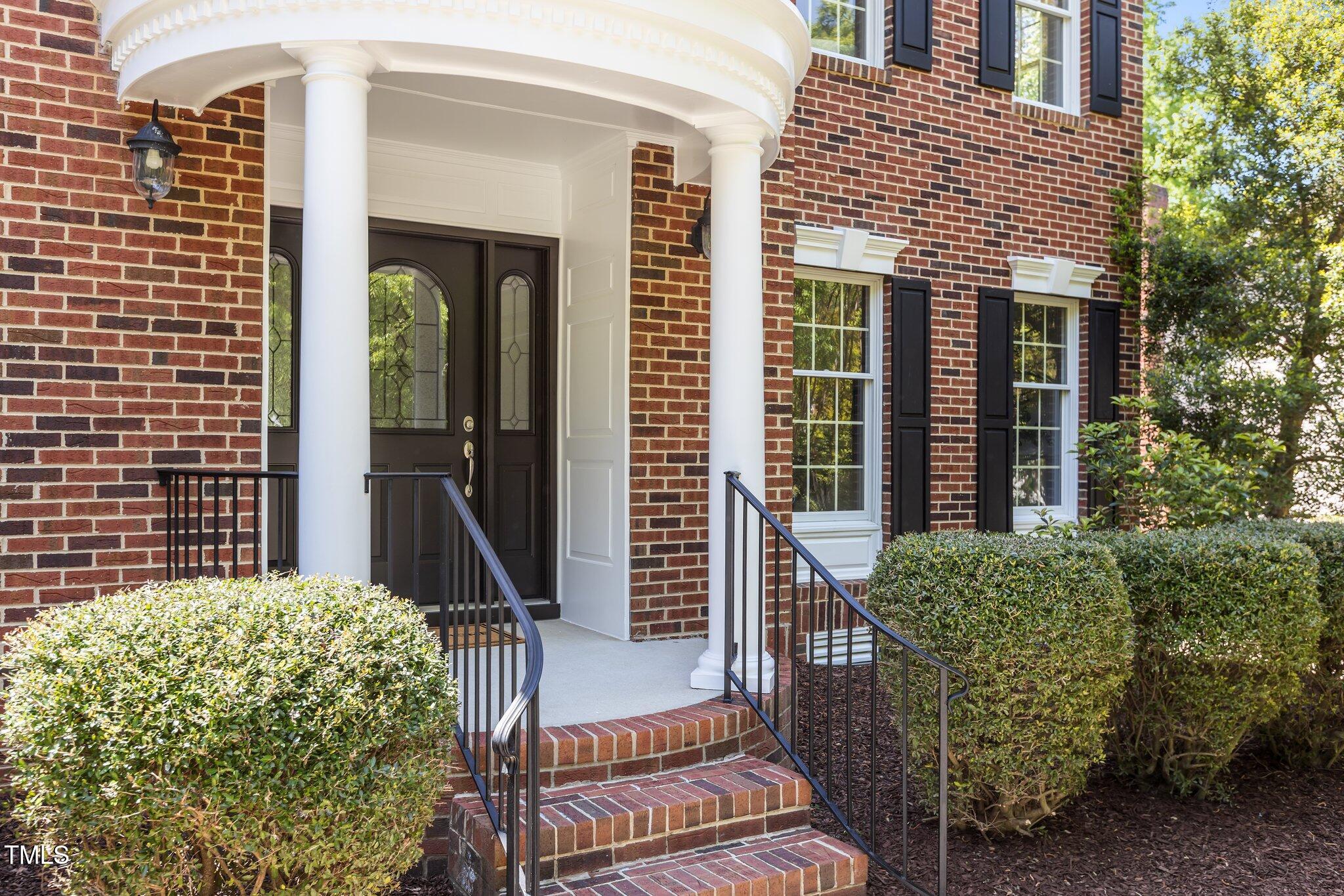 103 Ticonderoga Road Cary, NC 27519 - Photo 2 of 65 a view of a house with backyard and porch