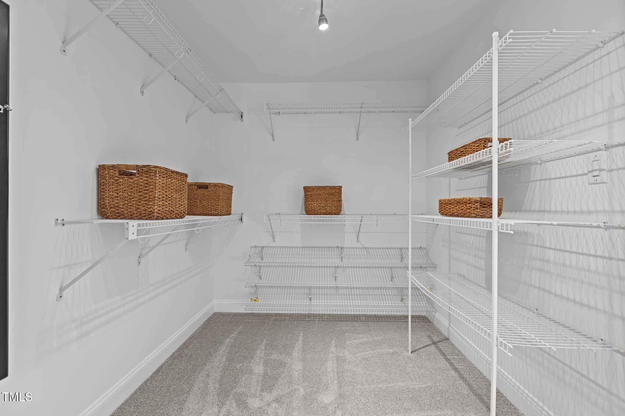 103 Ticonderoga Road Cary, NC 27519 - Photo 34 of 65 a view of walk in closet