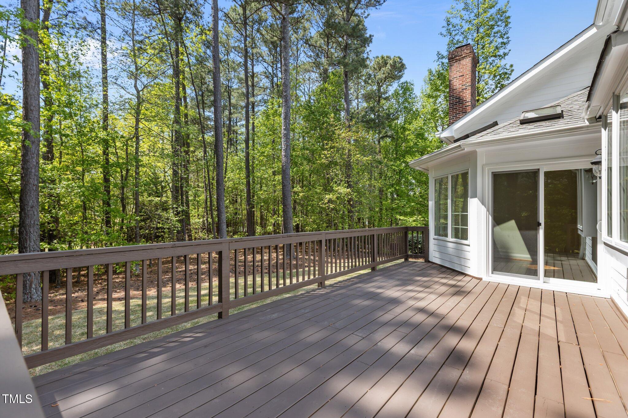 103 Ticonderoga Road Cary, NC 27519 - Photo 44 of 65 a view of backyard with a deck and wooden floor