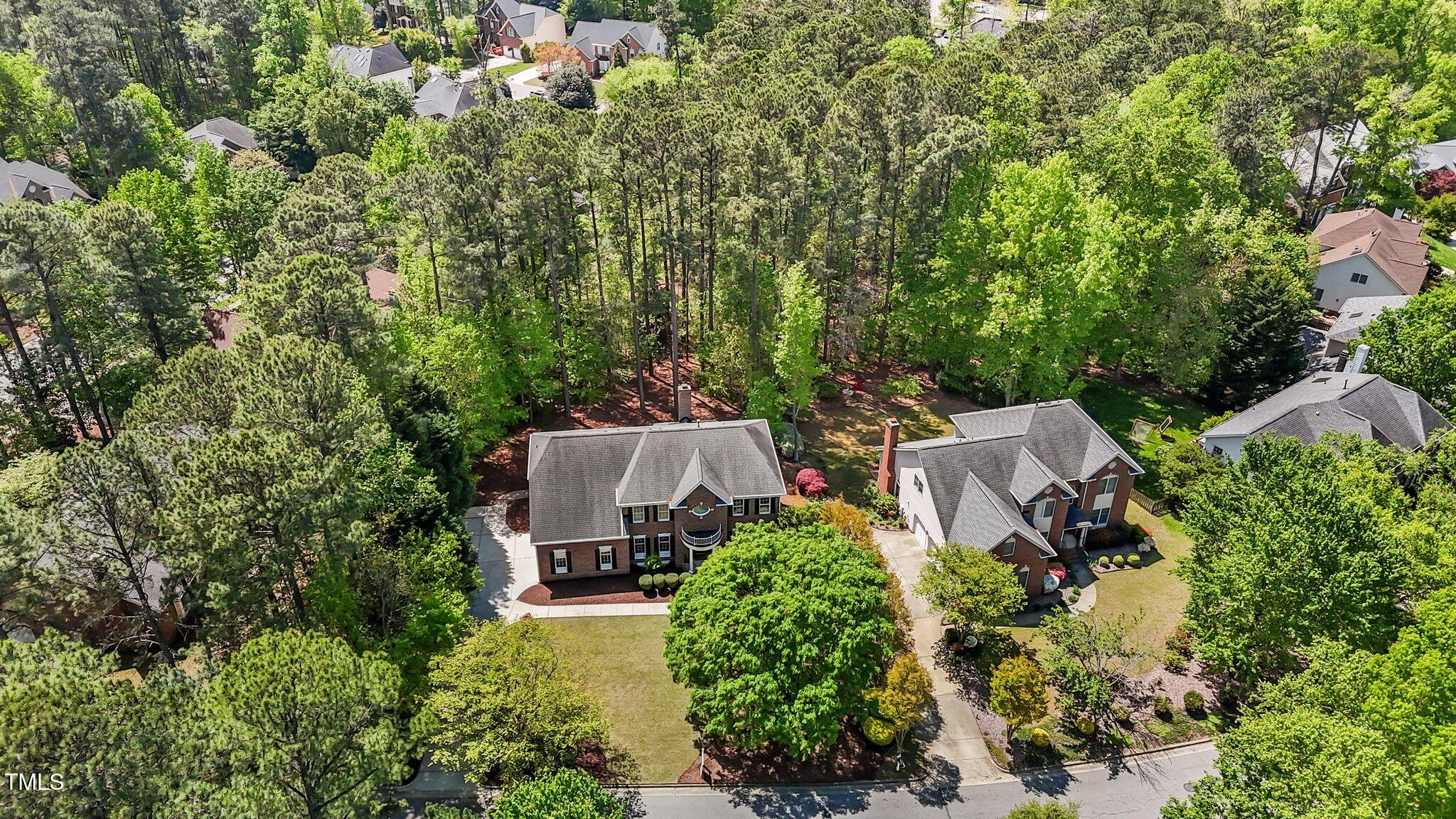 103 Ticonderoga Road Cary, NC 27519 - Photo 53 of 65 an aerial view of a house with a garden