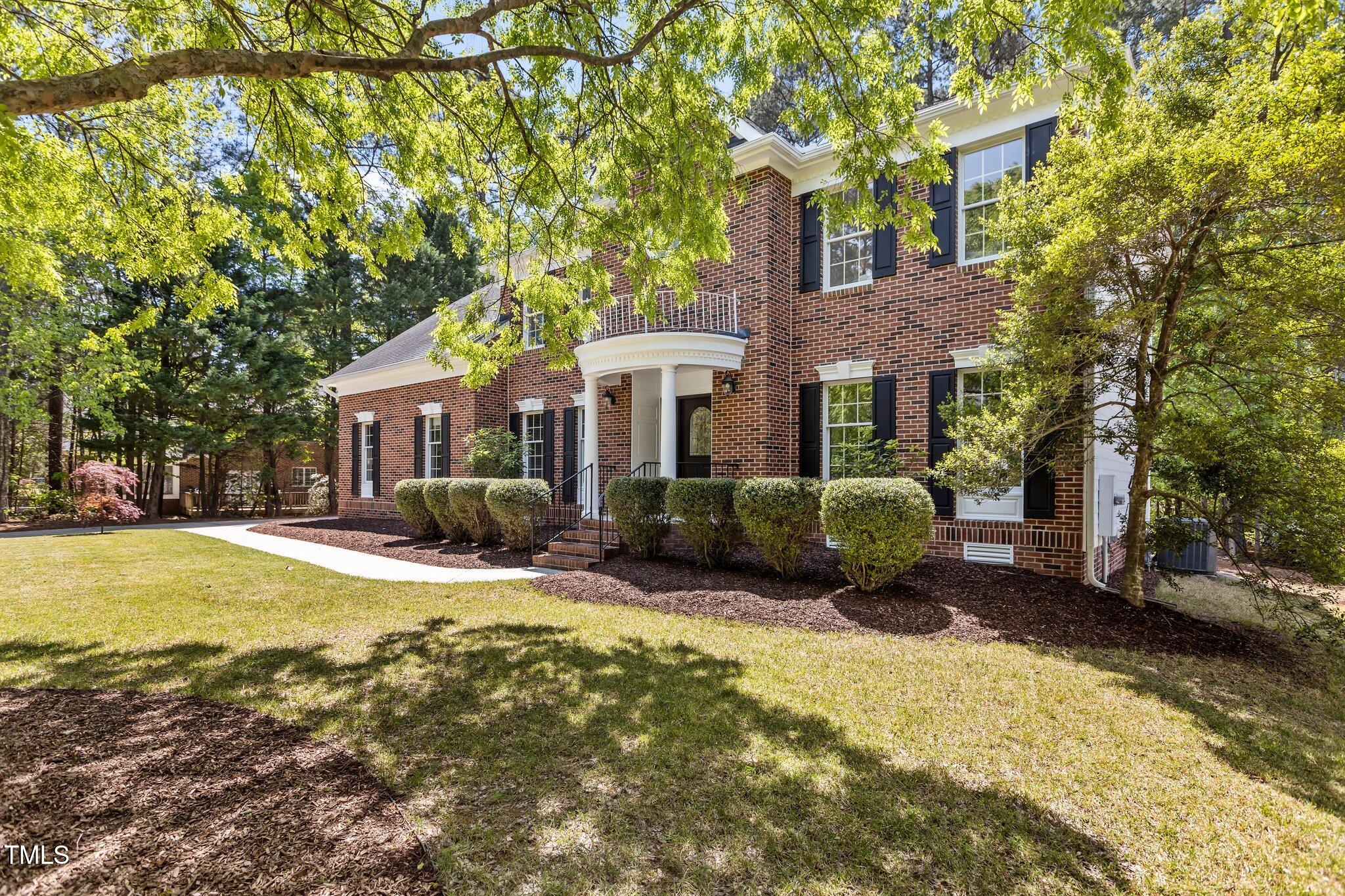 103 Ticonderoga Road Cary, NC 27519 - Photo 54 of 65 a view of a house with a yard and tree s