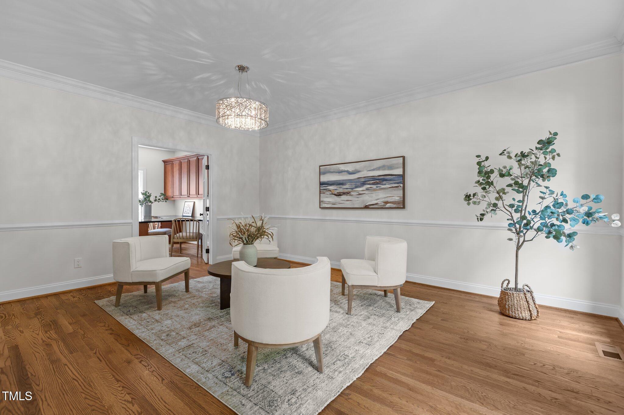 103 Ticonderoga Road Cary, NC 27519 - Photo 4 of 65 a living room with furniture and a potted plant