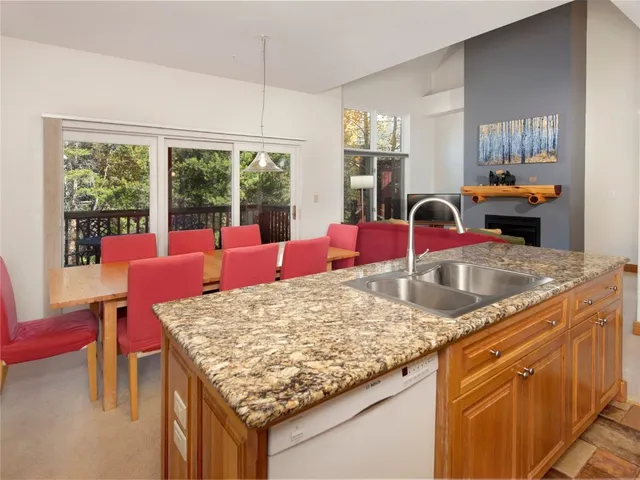 a kitchen with granite countertop sink and granite counter tops