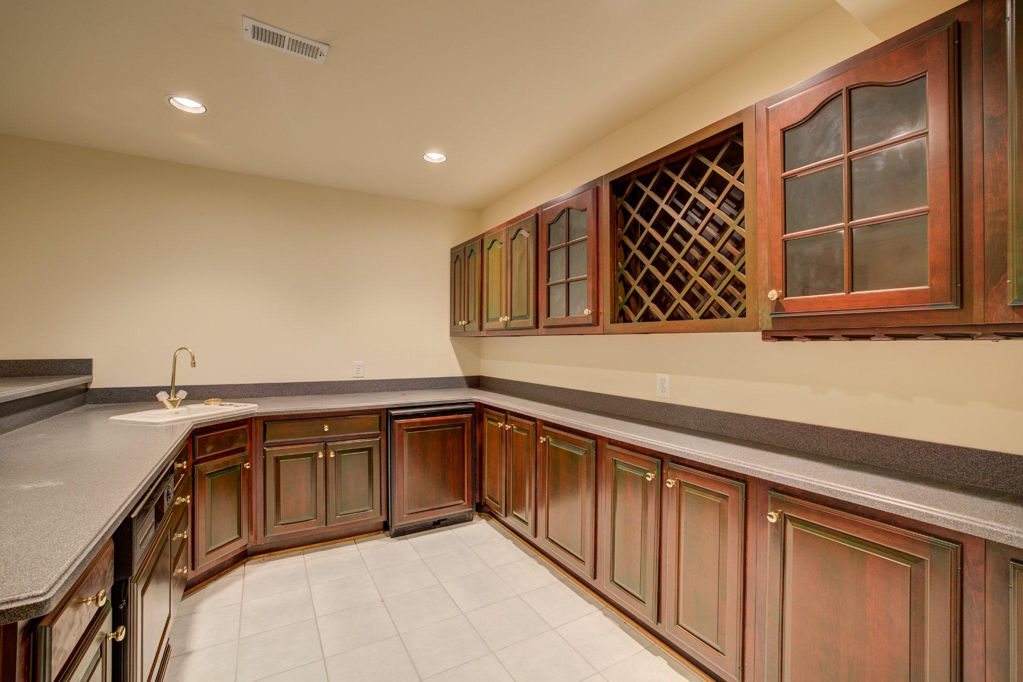 731 Utterback Store Road Great Falls, VA 22066 - Photo 11 of 19 Lower level bar and rec area