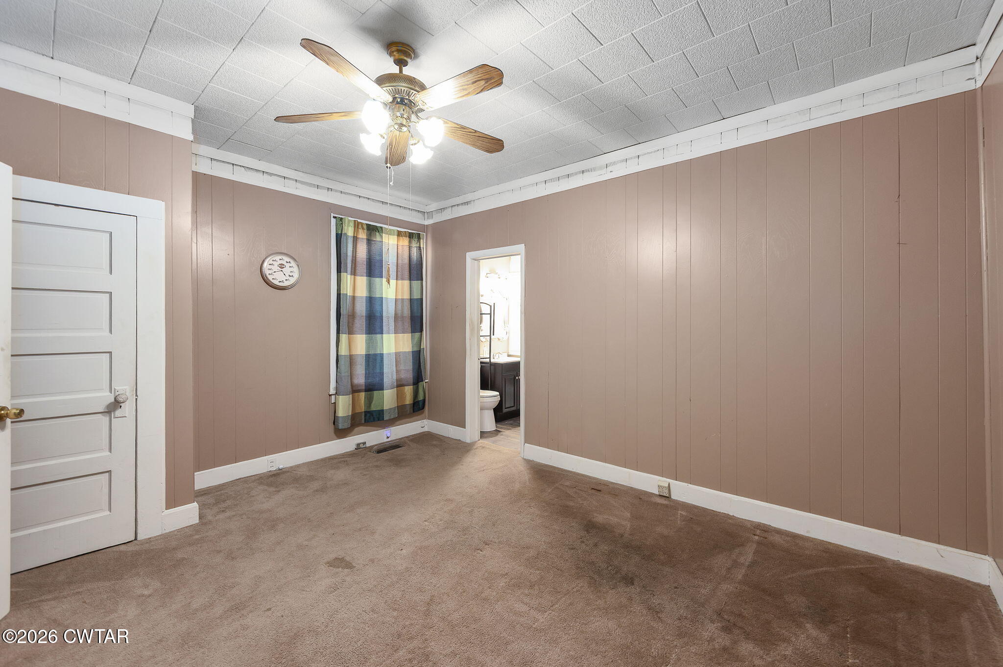 4 Farwell Street Jackson, TN 38301 - Photo 13 of 25 an empty room with windows and fan