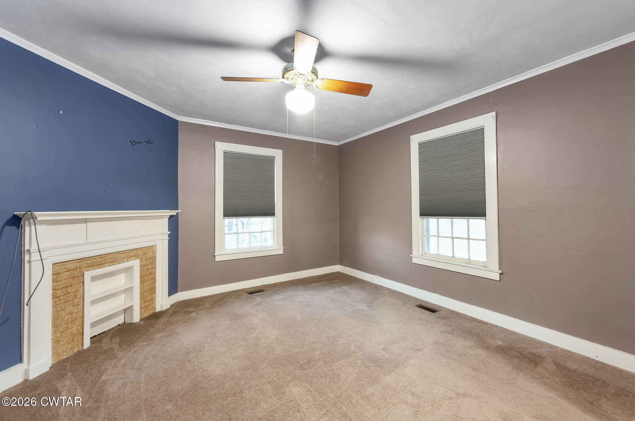 4 Farwell Street Jackson, TN 38301 - Photo 15 of 25 a view of an empty room with window and chandelier fan