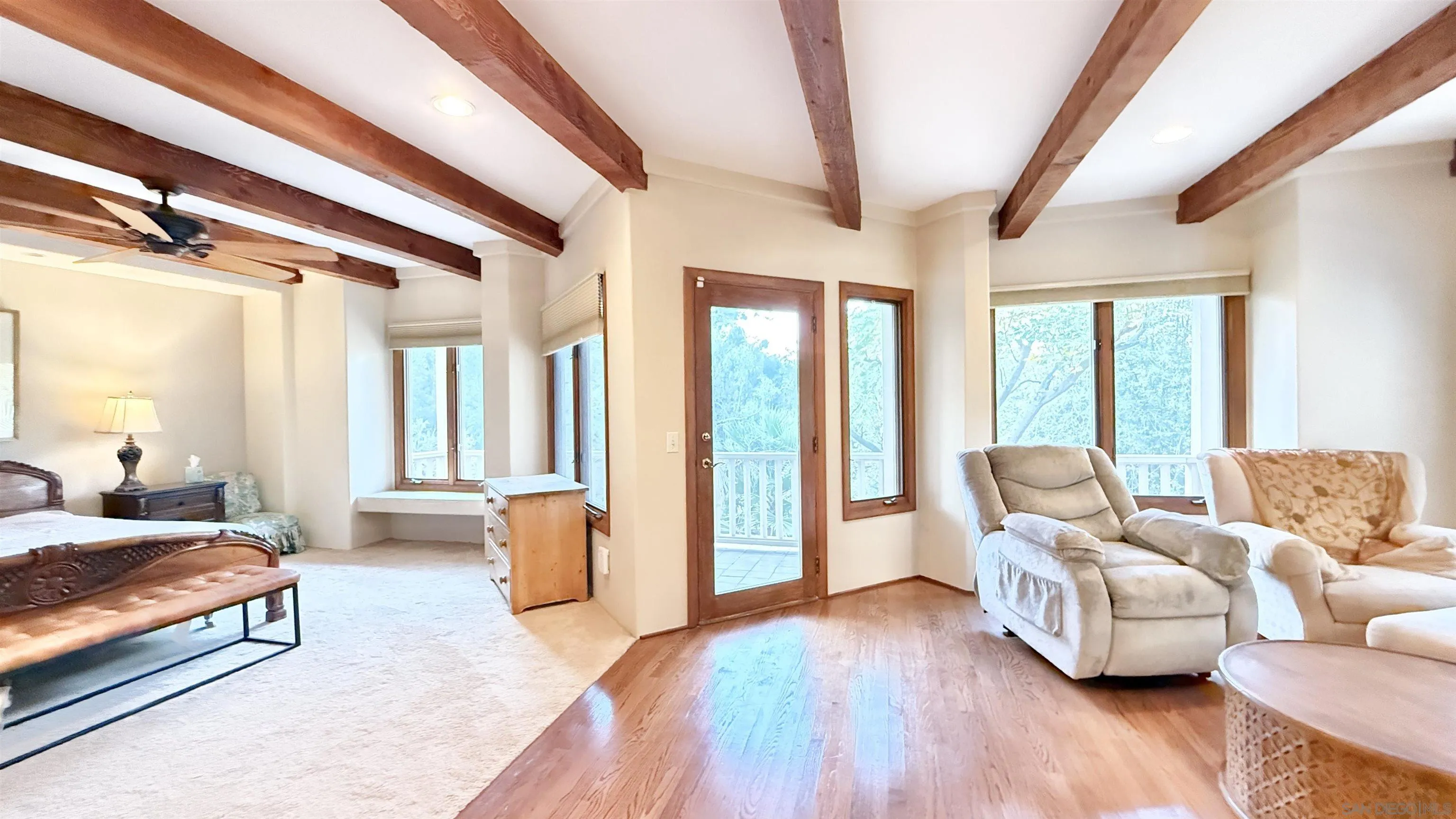 16722 Via Lago Azul Rancho Santa Fe, CA 92067 - Photo 11 of 28 a spacious bedroom with furniture and wooden floor