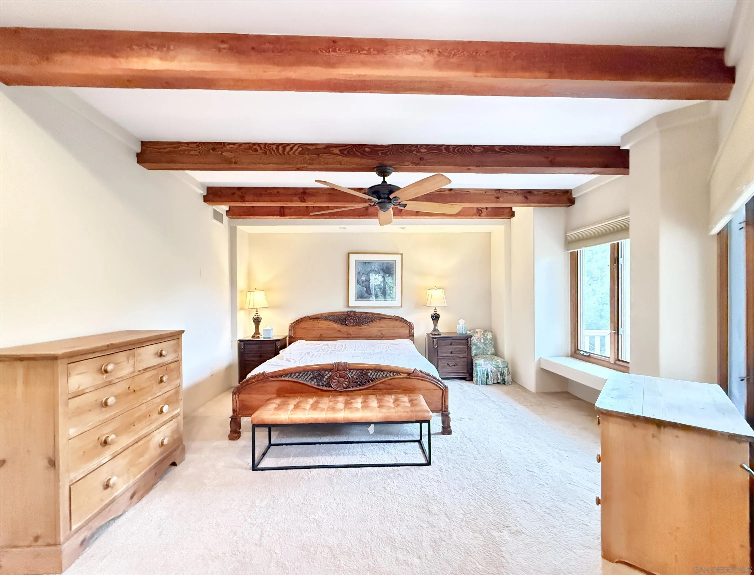16722 Via Lago Azul Rancho Santa Fe, CA 92067 - Photo 12 of 28 a spacious bedroom with a bed and wooden floor