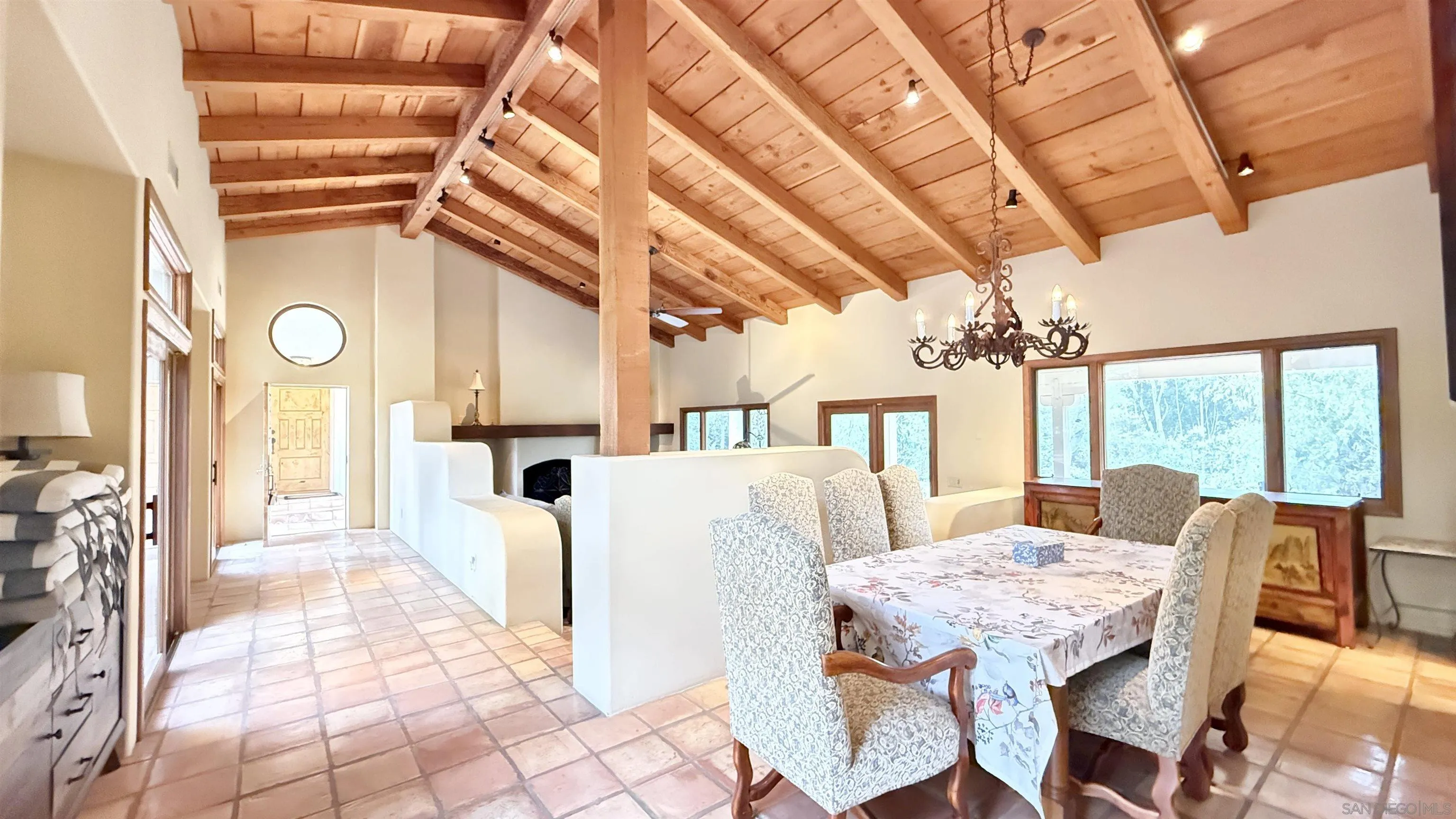 16722 Via Lago Azul Rancho Santa Fe, CA 92067 - Photo 2 of 28 a view of a dining room with furniture window and wooden floor