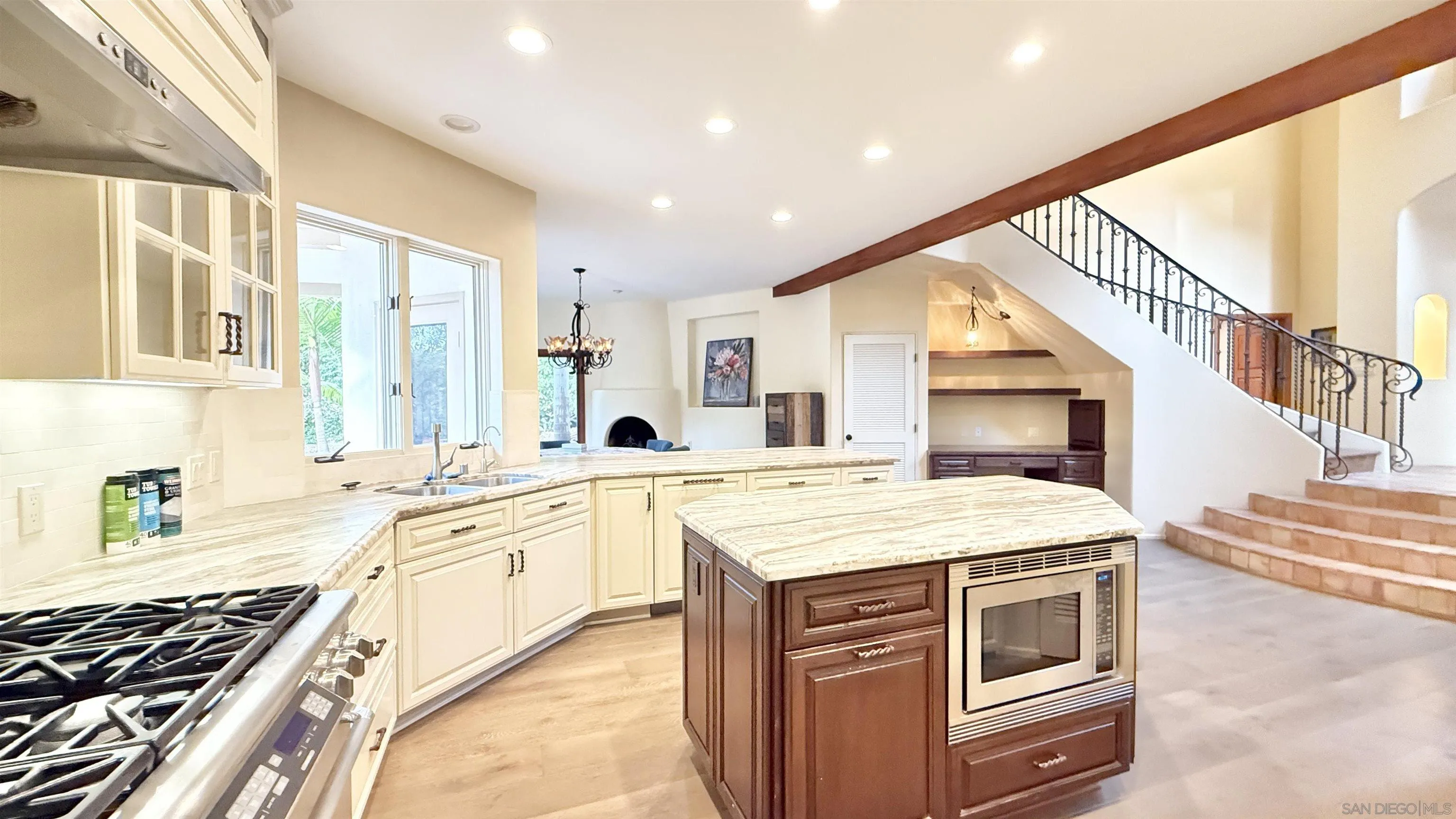 16722 Via Lago Azul Rancho Santa Fe, CA 92067 - Photo 3 of 28 a kitchen with a stove a sink and a refrigerator