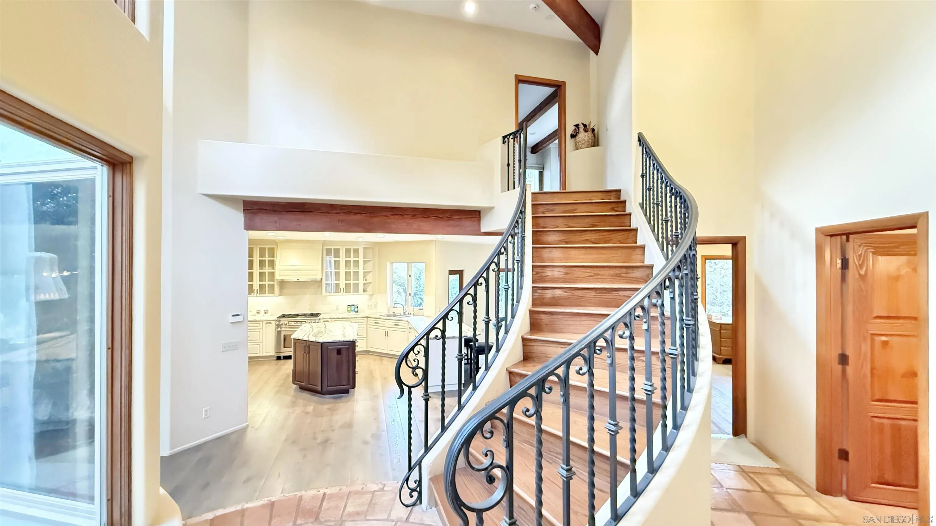16722 Via Lago Azul Rancho Santa Fe, CA 92067 - Photo 9 of 28 a view of entryway and hall with wooden floor
