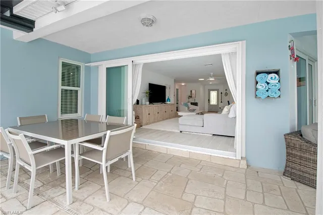 a view of a livingroom with furniture and window