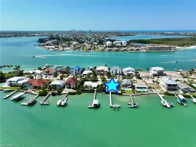 a table and chairs with an outdoor space