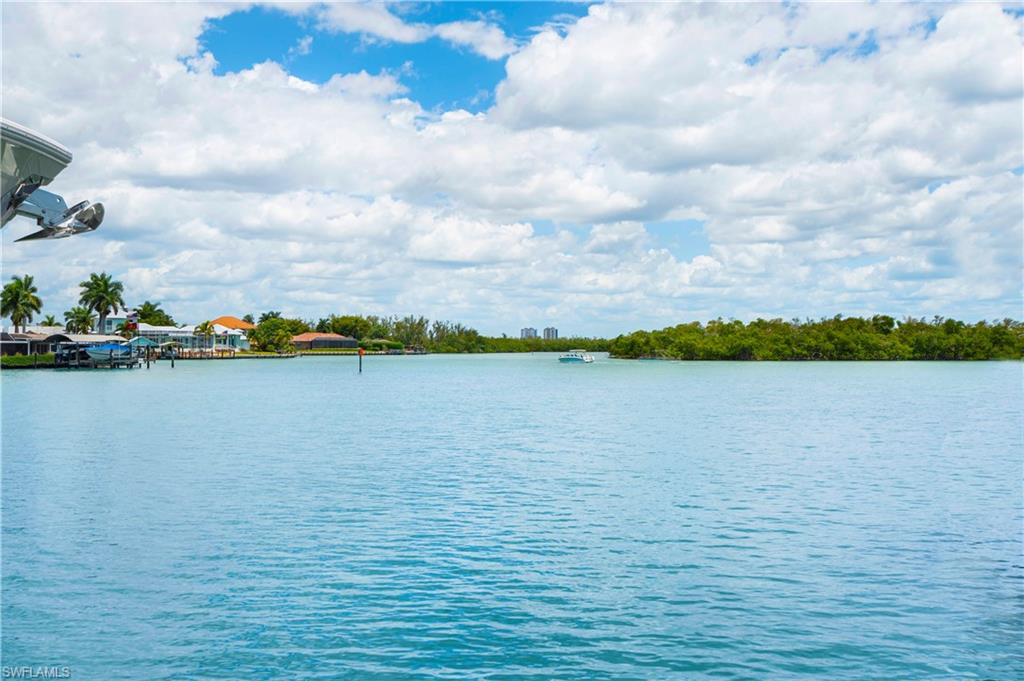 19 East Pelican Street Naples, FL 34113 - Photo 50 of 50 a view of a lake view