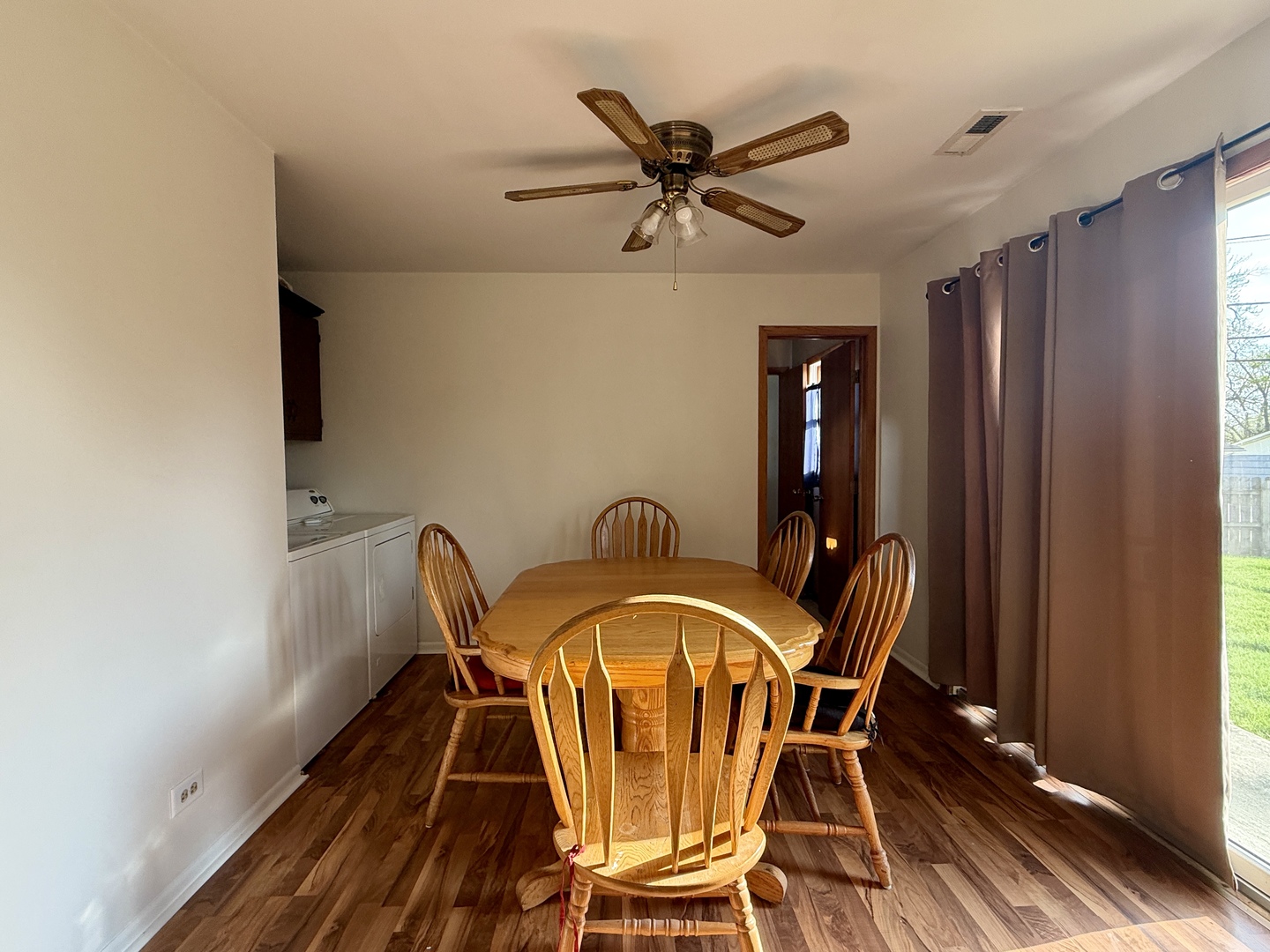203 MacGregor Road Lockport, IL 60441 - Photo 4 of 12 a view of a dining room with furniture and wooden floor