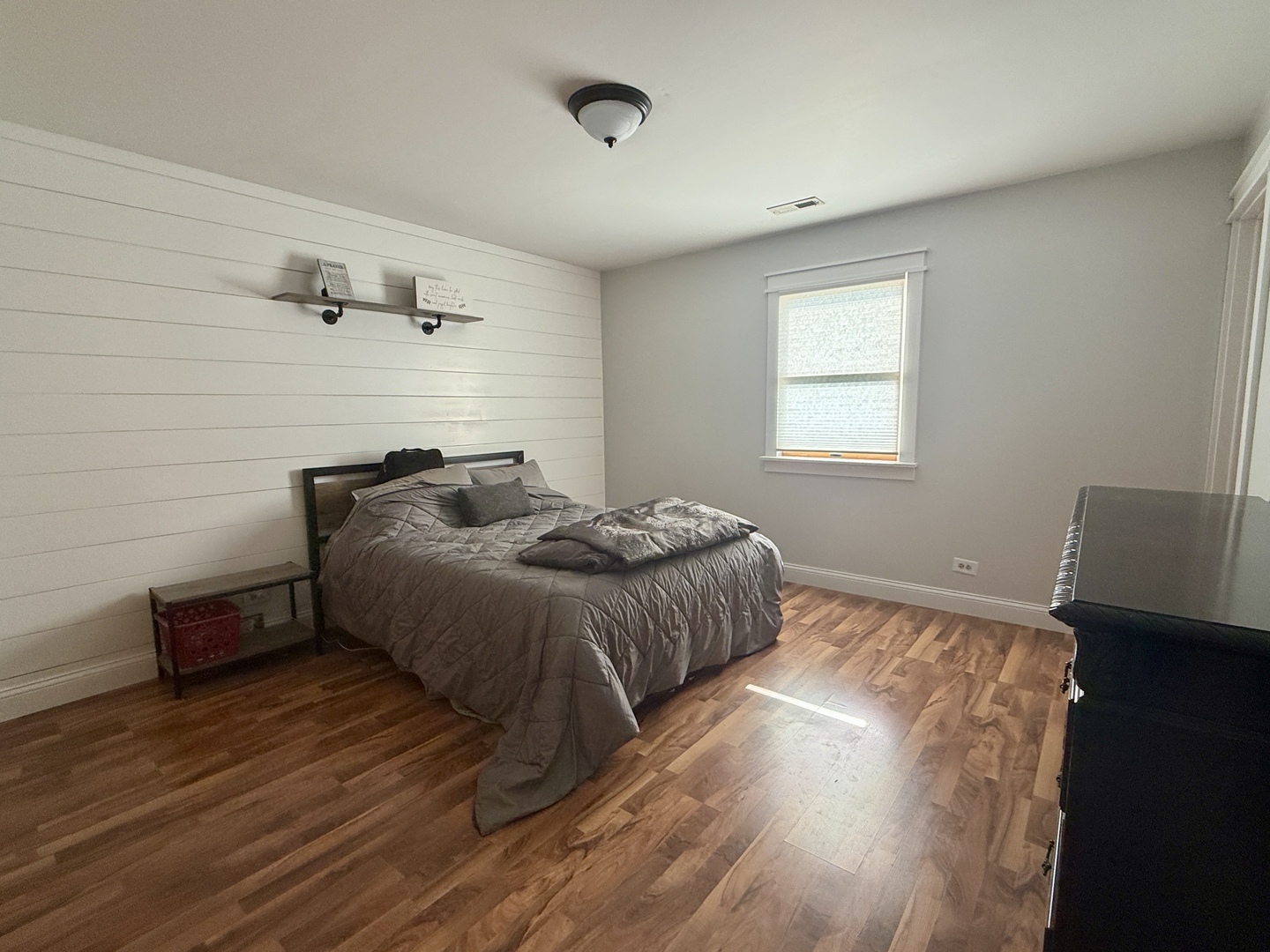 203 MacGregor Road Lockport, IL 60441 - Photo 9 of 12 a bedroom with a bed and wooden floor